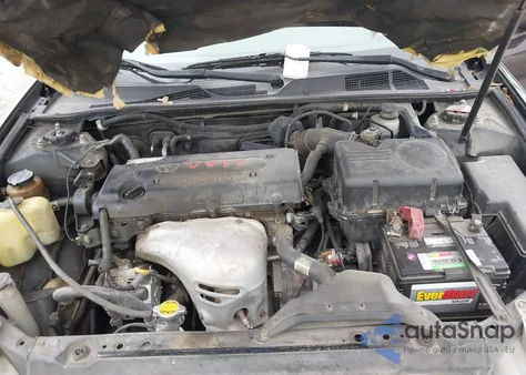 2002 Toyota Camry Le z USA, uszkodzony, nr VIN JTDBE32K720119418